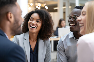 Joyful Diverse Business Team Laughing in Modern Office Setting