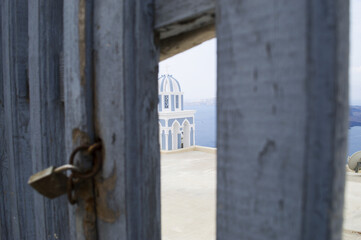 Through the Keyhole of beautiful Santorini Greece,Christian orthodox church 

