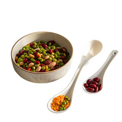 Porcelain spoons alongside a dish filled with vibrant dried beans, peas, and lentils, all set against a light off-white backdrop with gentle shadows