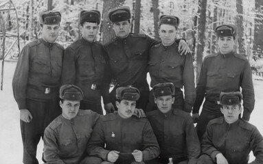Bobruisk, USSR - CIRCA 1966: A group of Soviet soldiers pose in the forest in winter