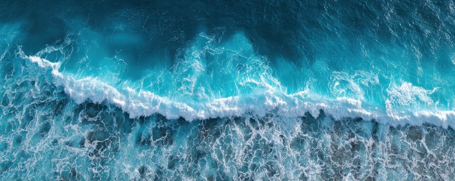 Pure blue turquoise water texture of the ocean sea with foam from and waves. MZ 