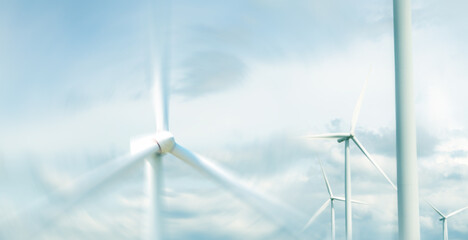 Wind turbines renewable energy concept clean energy use to produce electricity through the...