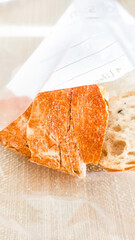 Sliced bread being preserved in freezer bag for longer shelf life