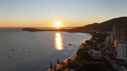 First light touches the ocean as the day begins — golden skies, calm seas, and nature in perfect...