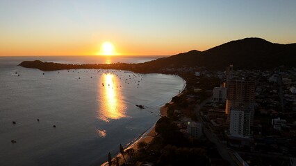 First light touches the ocean as the day begins — golden skies, calm seas, and nature in perfect...