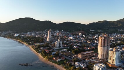 First light touches the ocean as the day begins — golden skies, calm seas, and nature in perfect...