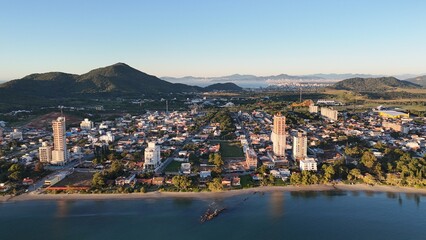 First light touches the ocean as the day begins — golden skies, calm seas, and nature in perfect balance along the Brazilian coast.