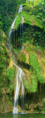Pha Nam Yod Waterfall is 35 meters high and consists of three levels, shaped like umbrellas. It is...