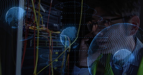 Calling tech wearing safety vest inspecting rack cables in server room, digital globes, copy space