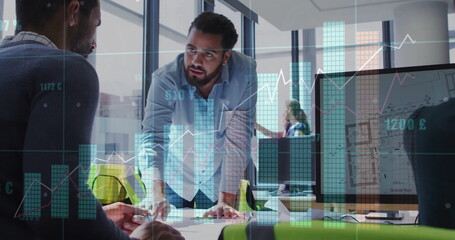 Leading Middle Eastern male leaning on table and speaking in modern office, with chart overlays