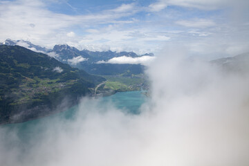 Summer Landscape in Amden, Swiss Alps, with Lake Walensee and Low Clouds

