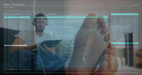 Touching holographic display by hand in office showing code logs with business casual colleagues
