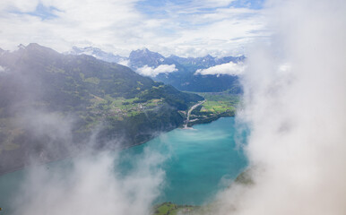 Summer Landscape in Amden, Swiss Alps, with Lake Walensee and Low Clouds
