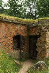 old iron lattice door leading into the fortress
