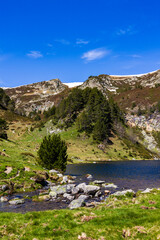 Rabassoles Lake in the heart of the Donezan Massif with the last spring snow