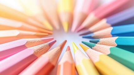 Colorful pencils arranged in a circular pattern, creating a lively and energetic atmosphere.