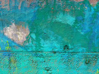old green concrete wall with scuffs close up texture