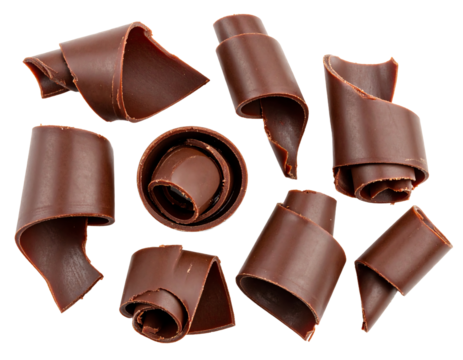 Artistic chocolate curls for dessert decoration.