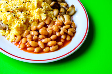 Scrambled Eggs Fried Mushrooms Baked Beans and Tomato Sauce