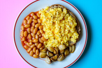 Scrambled Eggs Fried Mushrooms Baked Beans and Tomato Sauce