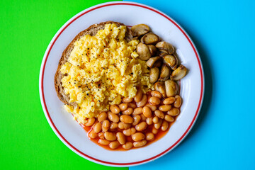 Scrambled Eggs Fried Mushrooms Baked Beans and Tomato Sauce