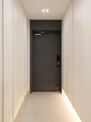 Install warm colored light bulbs in the hallway to give the house a warm feeling