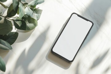 A flat lay of a smartphone with a blank screen