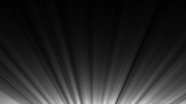 Abstract black and white light rays bursting outward from the bottom creating a dramatic effect