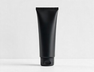 Matte black plastic tube, centered on white background, packaging, minimalist