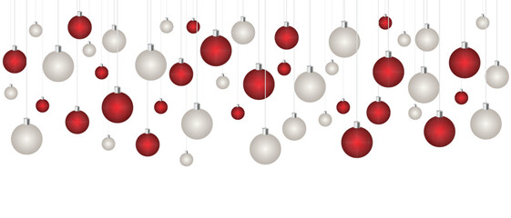 A festive arrangement of red and white spherical ornaments suspended from strings against a clean white background. The scene evokes holiday cheer and decorative simplicity.