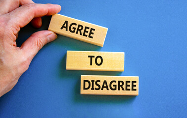 Agree to disagree symbol. Concept words Agree to disagree on beautiful wooden block. Businessman's...