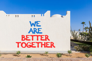 We are better together symbol. Concept words phrase We are better together on beautiful white wall....
