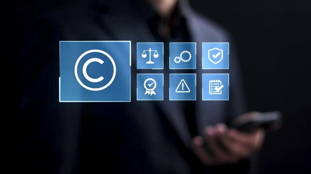 Copyright or patent concept. businessman touching copyright symbol on virtual screen for author rights and patent intellectual property