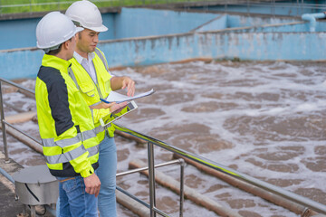 Environmental engineers work at wastewater treatment plants,Water supply engineering working at...