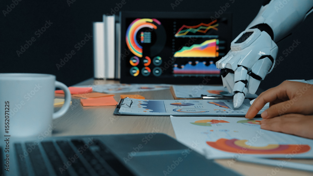 Poster a sophisticated workspace featuring a robotic hand analyzing charts and business data, reflecting th