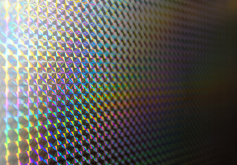 Holographic surface reflecting rainbow colors creating stunning visual effect