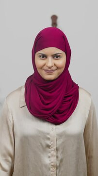 Vertical Video of Muslim Woman in Hijab Scarf Greeting Adab