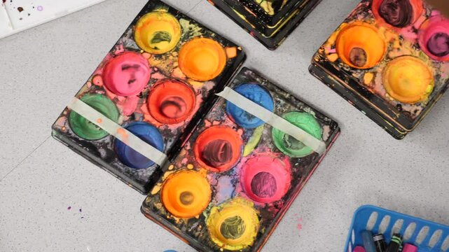Vibrant paint palettes ready for creative projects