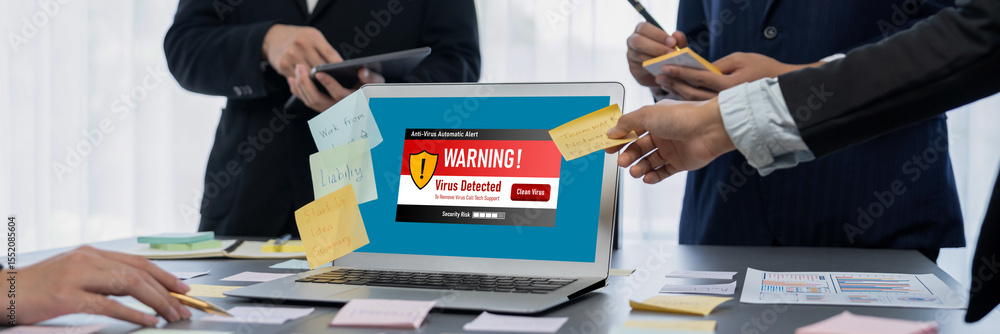 Poster virus warning alert on computer screen detected brisk cyber threat , hacker, computer virus and malw