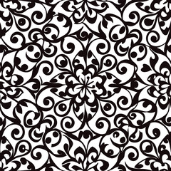 Vintage floral seamless pattern with black and white damask ornate leaves, perfect for textile and wallpaper design
