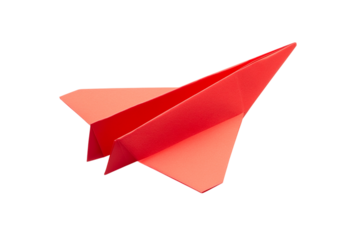 A red paper airplane isolated on a white isolated on a transparent background in PNG format.