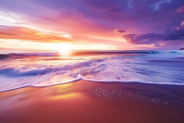 Vibrant sunset over the ocean with colorful skies reflecting on the sandy beach