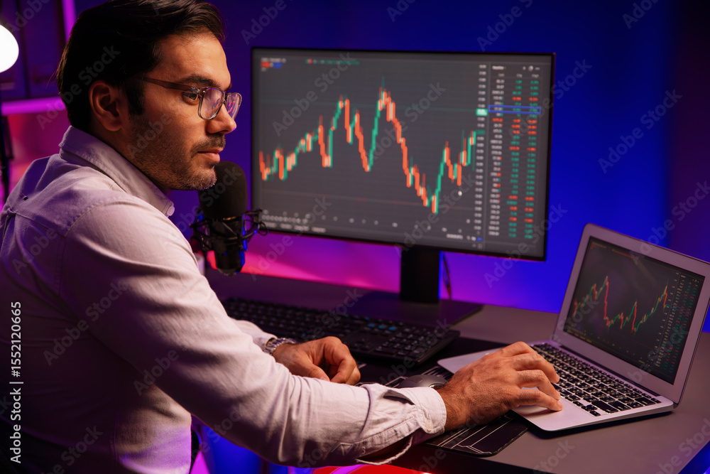 Poster smart trader businessman concentrating on dynamic stock exchange investment on pc and laptop showing