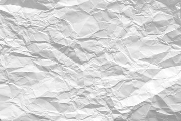 Folded Paper Texture with Shadows and Wrinkles. High-resolution white folded paper texture with visible creases, shadows, and natural wrinkles. 