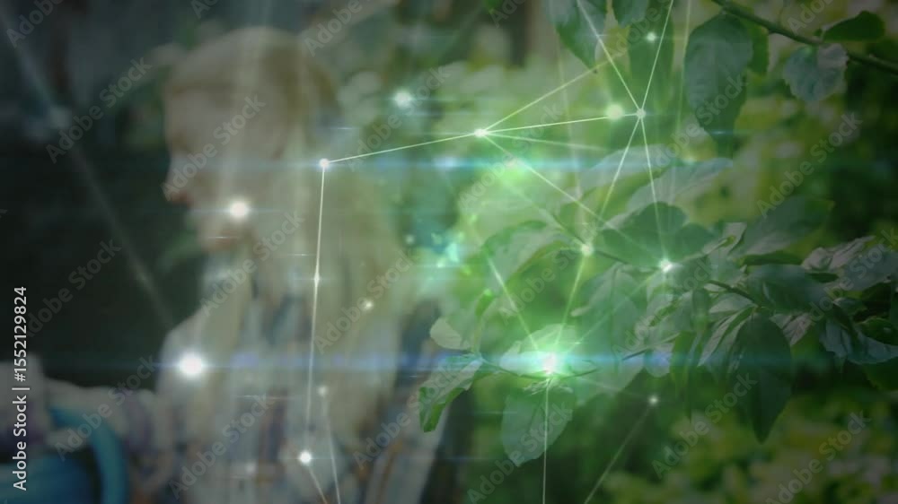 Poster gardener initiating watering lifting can over shrub while network overlay mapping foliage health