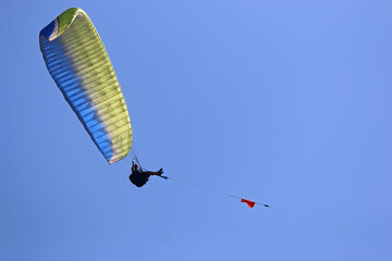 Paraglider being towed by a winch	