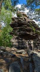 Devil's Hillfort complex on sunny summer day. Iset Park, Iset village, Sverdlovsk region, Russia. Hiking and walking.  Vertical image