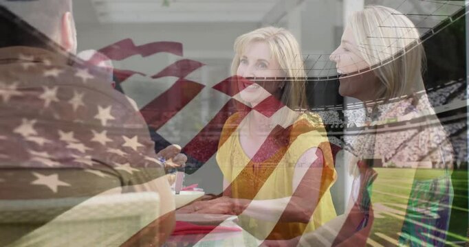 Uniformed soldier arriving beside grandfather on patio, family passing bottle and shaking hands