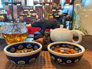 Cultural Tea Preparation with Calm Atmosphere and Utensils