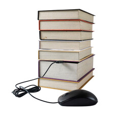 computer mouse connect to stack books.Data concept.